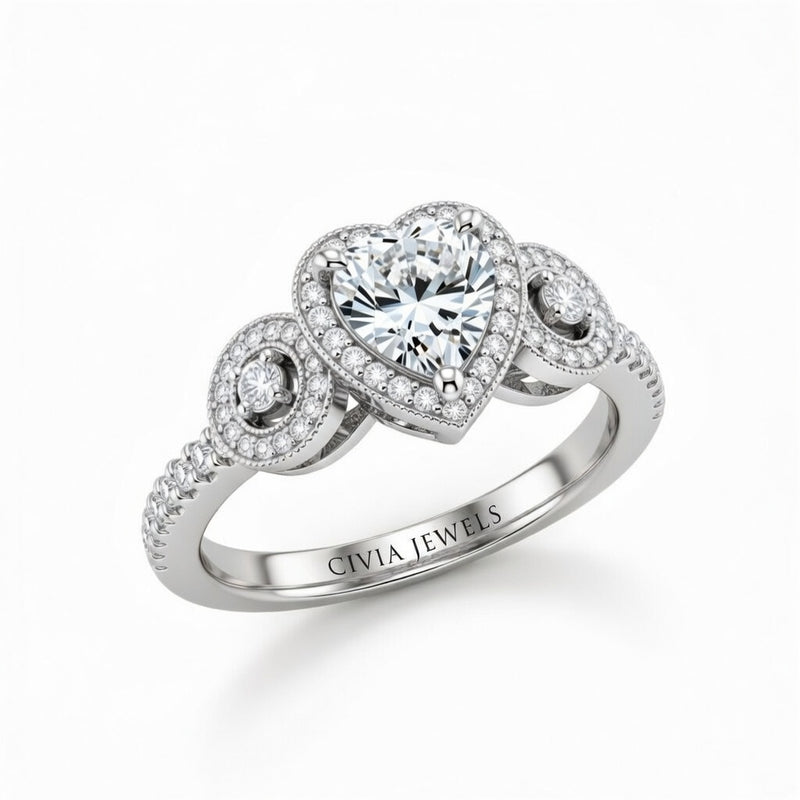 White Gold Heart Brilliant Three Stone Halo Engagement Ring With Vintage Milgrain Detail