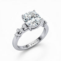 White Gold Cushion Cut Engagement Ring With Diamond Scatter Accent Shoulders And Classic Four-Prong Setting