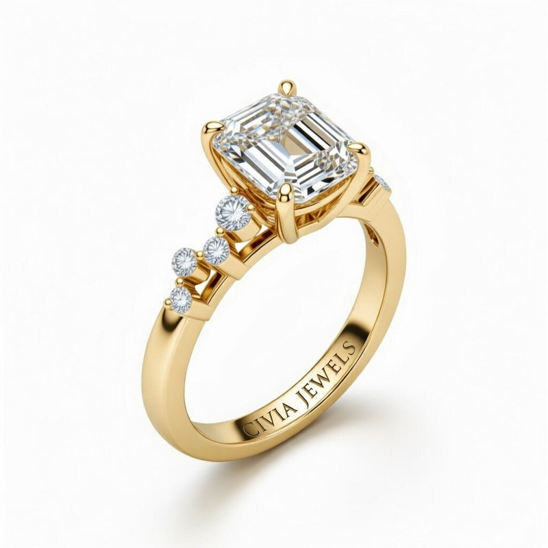 Yellow Gold Emerald Cut Engagement Ring With Diamond Scatter Accent Shoulders And Classic Four-Prong Setting
