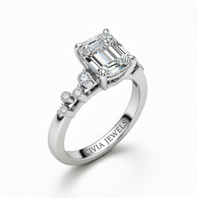 White Gold Emerald Cut Engagement Ring With Diamond Scatter Accent Shoulders And Classic Four-Prong Setting