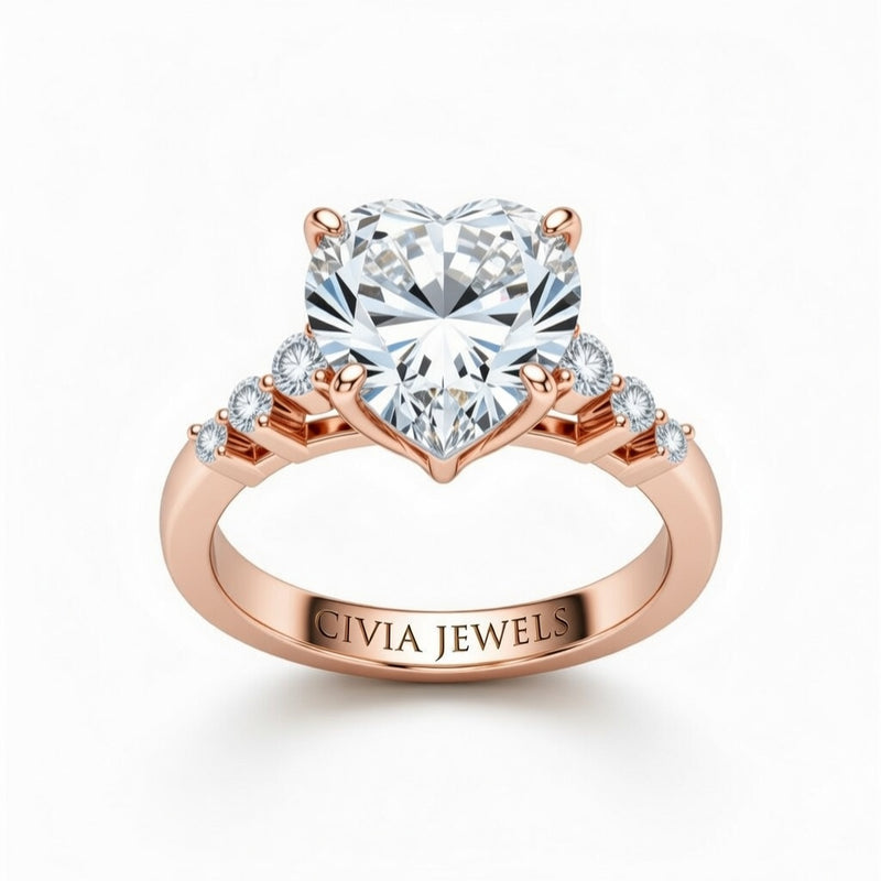 Rose Gold Heart Cut Engagement Ring With Diamond Scatter Accent Shoulders And Classic Four-Prong Setting