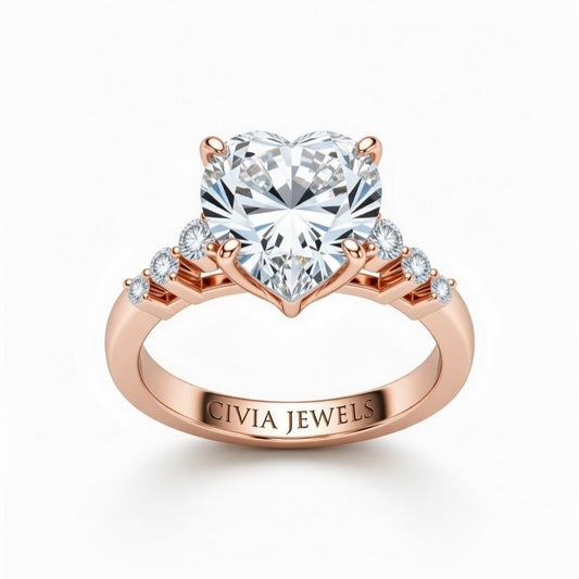Rose Gold Heart Cut Engagement Ring With Diamond Scatter Accent Shoulders And Classic Four-Prong Setting