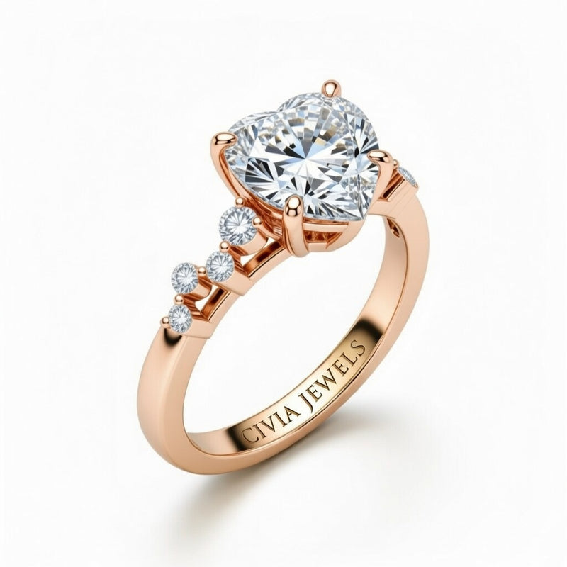 Rose Gold Heart Cut Engagement Ring With Diamond Scatter Accent Shoulders And Classic Four-Prong Setting