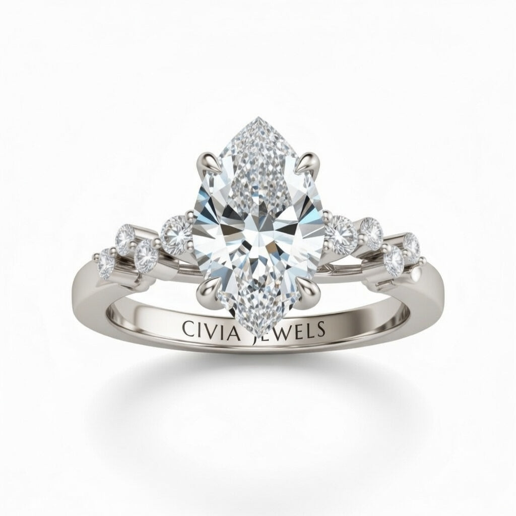 White Gold Marquise Cut Engagement Ring With Diamond Scatter Accent Shoulders And Classic Four-Prong Setting