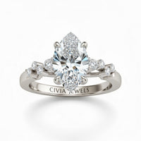 Silver Marquise Cut Engagement Ring With Diamond Scatter Accent Shoulders And Classic Four-Prong Setting