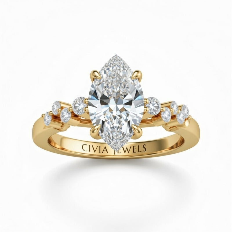 Yellow Gold Marquise Cut Engagement Ring With Diamond Scatter Accent Shoulders And Classic Four-Prong Setting