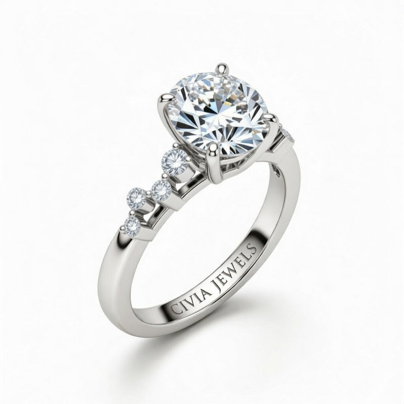 Silver Oval Cut Engagement Ring With Diamond Scatter Accent Shoulders And Classic Four-Prong Setting