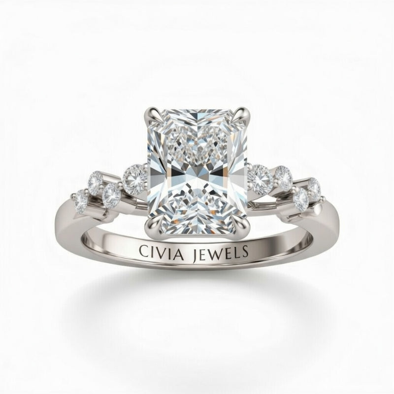 White Gold Radiant Cut Engagement Ring With Diamond Scatter Accent Shoulders And Classic Four-Prong Setting