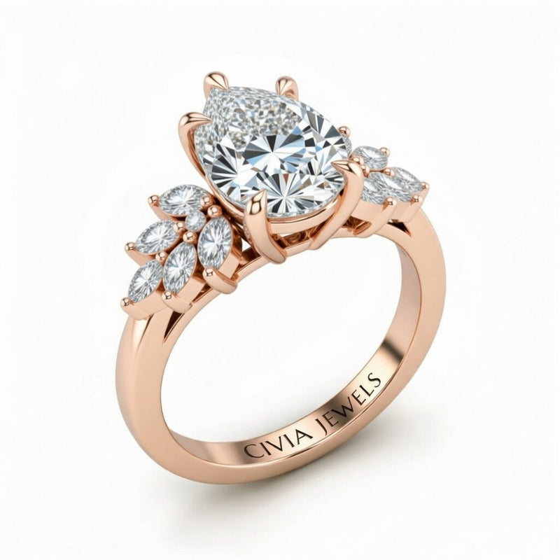 Rose Gold Pear Cut Engagement Ring With Marquise Diamond Cluster Side Accents
