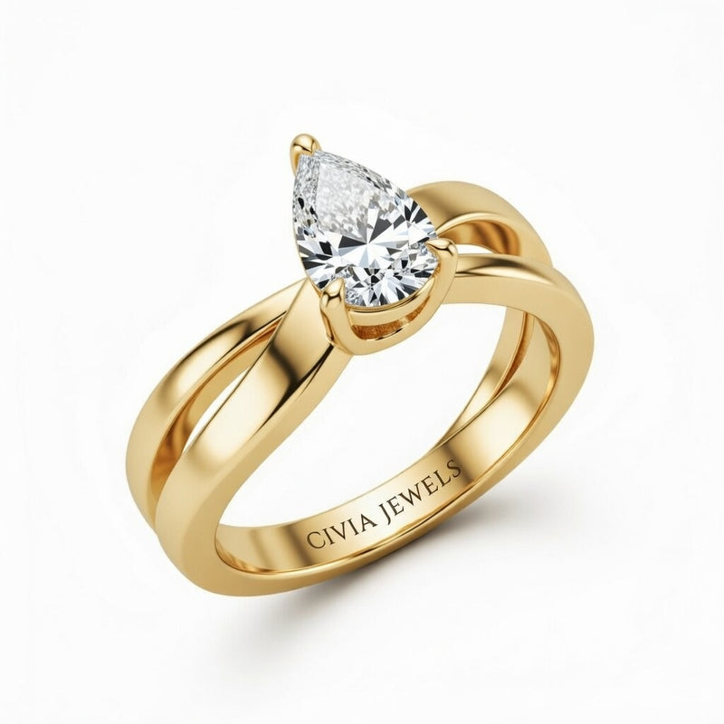 Yellow Gold Pear Cut Solitaire Engagement Ring With Sculpted Multirow Twist Shank