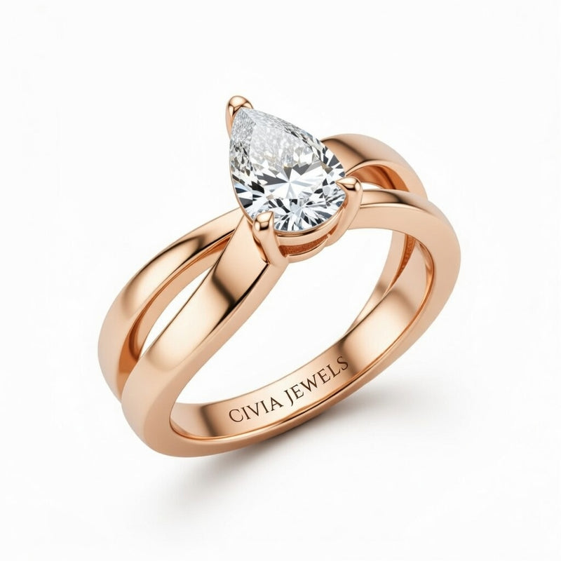 Rose Gold Pear Cut Solitaire Engagement Ring With Sculpted Multirow Twist Shank