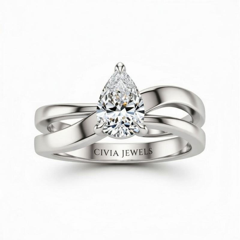 Silver Pear Cut Solitaire Engagement Ring With Sculpted Multirow Twist Shank
