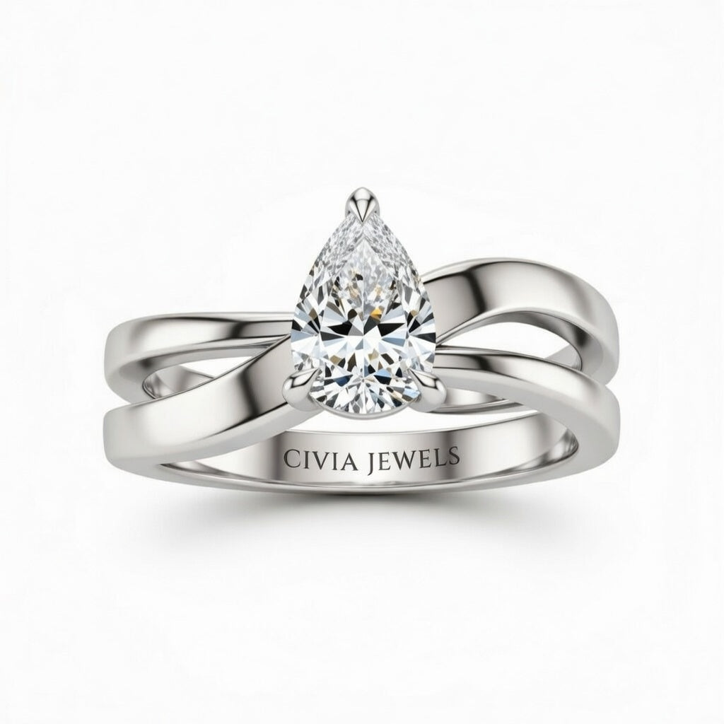 Silver Pear Cut Solitaire Engagement Ring With Sculpted Multirow Twist Shank
