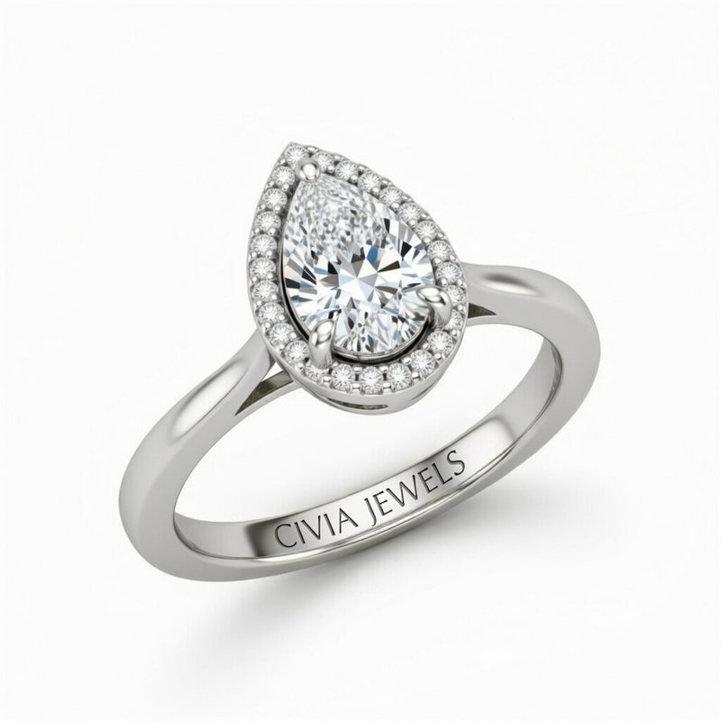 White Gold Pear Cut Halo Engagement Ring With Classic Four Prong Setting And Slim Band