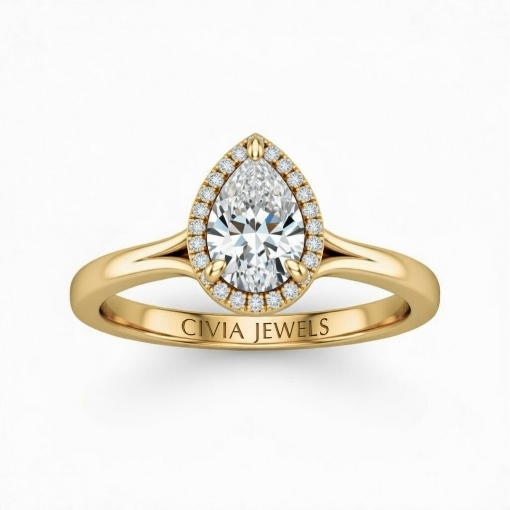 Yellow Gold Pear Cut Halo Engagement Ring With Classic Four Prong Setting And Slim Band
