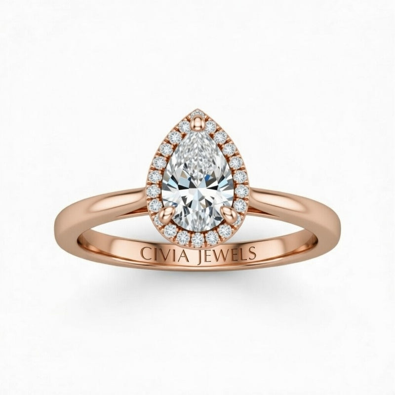 Rose Gold Pear Cut Halo Engagement Ring With Classic Four Prong Setting And Slim Band