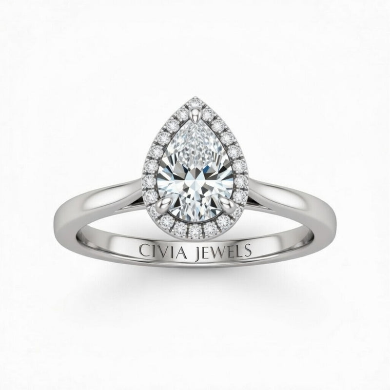 White Gold Pear Cut Halo Engagement Ring With Classic Four Prong Setting And Slim Band