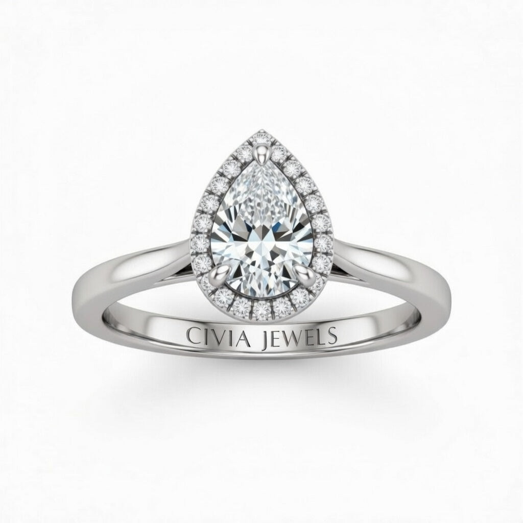 Silver Pear Cut Halo Engagement Ring With Classic Four Prong Setting And Slim Band