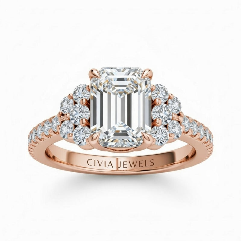 Rose Gold Emerald Cut Engagement Ring With Diamond Cluster Side Accents And Pavé Band
