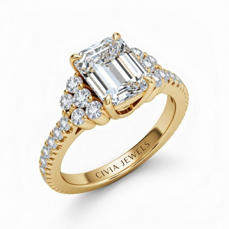 Yellow Gold Emerald Cut Engagement Ring With Diamond Cluster Side Accents And Pavé Band