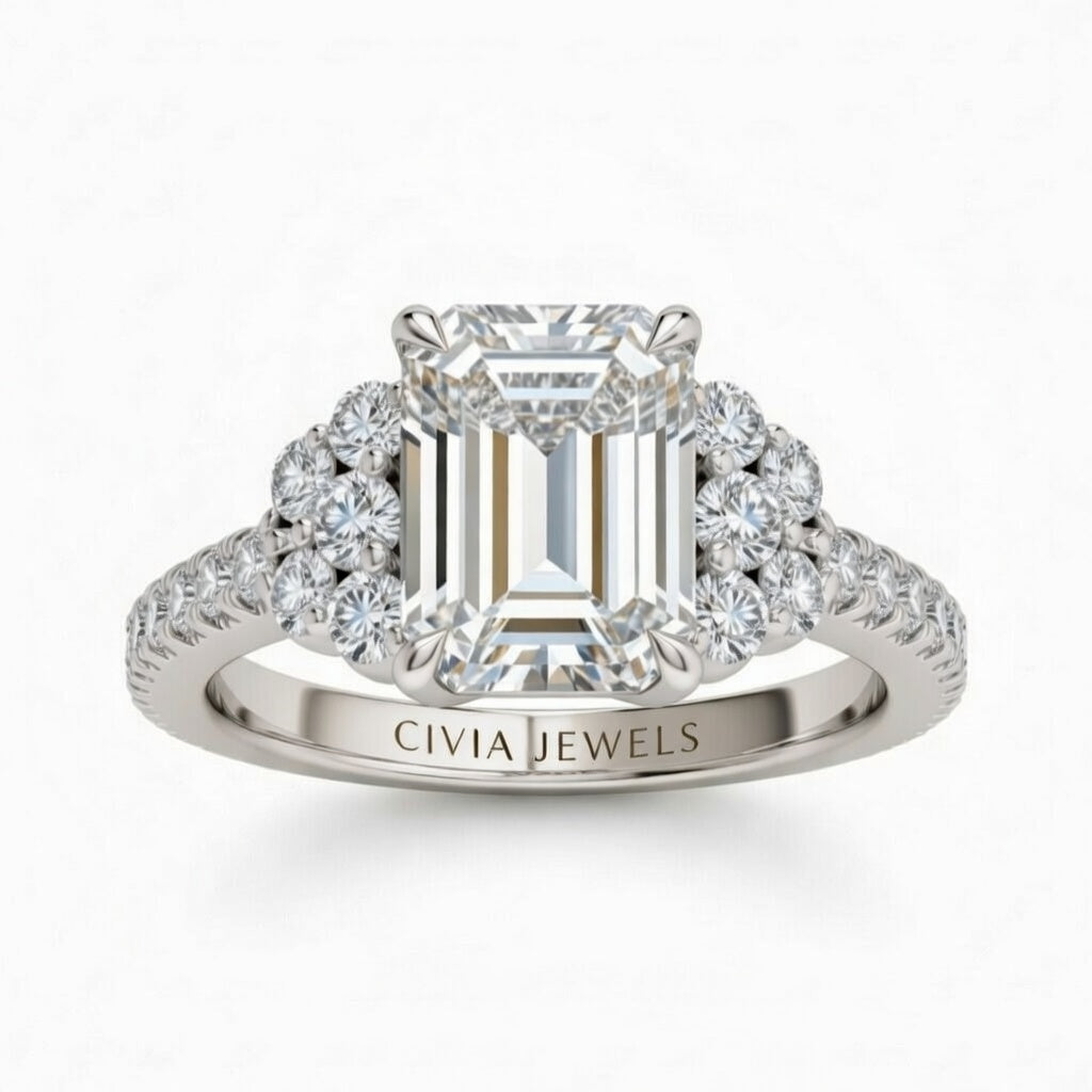 White Gold Emerald Cut Engagement Ring With Diamond Cluster Side Accents And Pavé Band