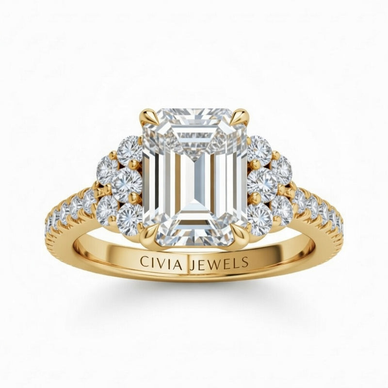 Yellow Gold Emerald Cut Engagement Ring With Diamond Cluster Side Accents And Pavé Band