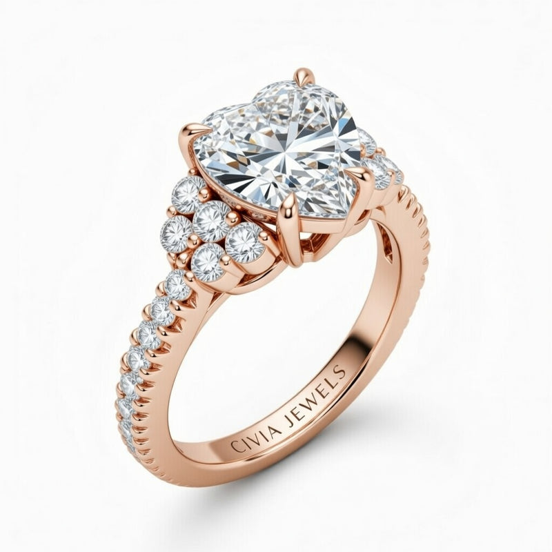 Rose Gold Heart Cut Engagement Ring With Diamond Cluster Side Accents And Pavé Band