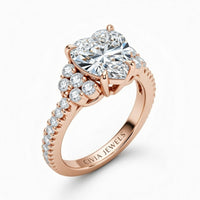 Rose Gold Heart Cut Engagement Ring With Diamond Cluster Side Accents And Pavé Band