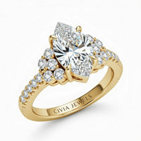 Yellow Gold Marquise Cut Engagement Ring With Diamond Cluster Side Accents And Pavé Band