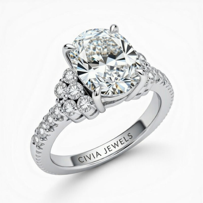 White Gold Oval Cut Engagement Ring With Diamond Cluster Side Accents And Pavé Band