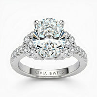 White Gold Oval Cut Engagement Ring With Diamond Cluster Side Accents And Pavé Band