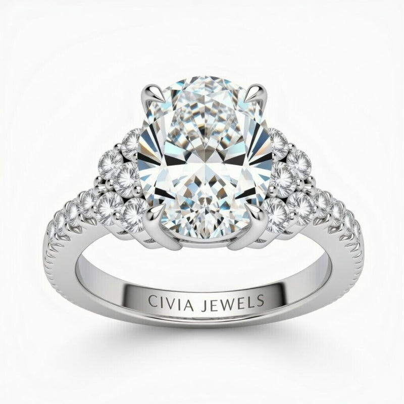 Silver Oval Cut Engagement Ring With Diamond Cluster Side Accents And Pavé Band