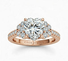 Rose Gold Heart Cut Engagement Ring With Diamond Cluster Side Accents And Pavé Band