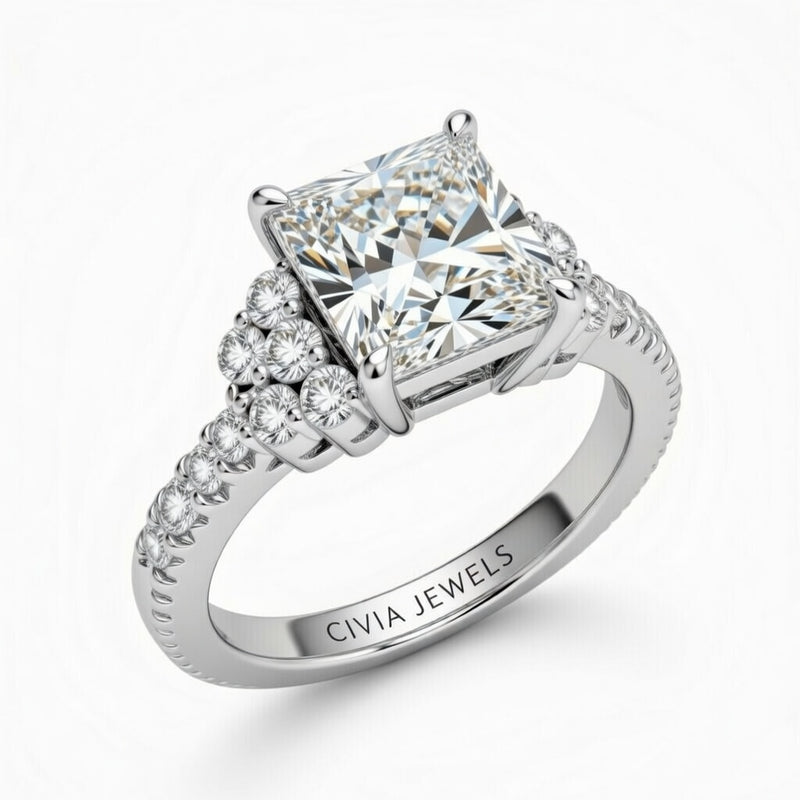Silver Princess Cut Engagement Ring With Diamond Cluster Side Accents And Pavé Band