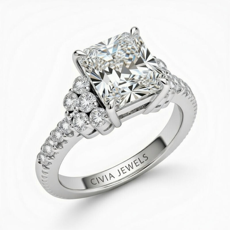 Silver Radiant Cut Engagement Ring With Diamond Cluster Side Accents And Pavé Band