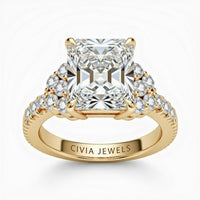 Yellow Gold Radiant Cut Engagement Ring With Diamond Cluster Side Accents And Pavé Band