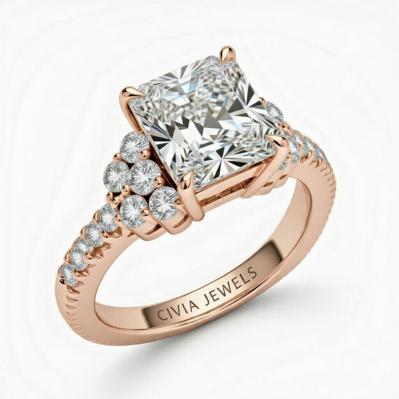 Rose Gold Radiant Cut Engagement Ring With Diamond Cluster Side Accents And Pavé Band