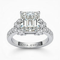 White Gold Radiant Cut Engagement Ring With Diamond Cluster Side Accents And Pavé Band