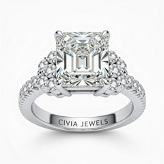 White Gold Radiant Cut Engagement Ring With Diamond Cluster Side Accents And Pavé Band