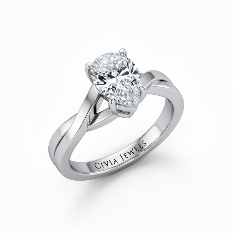 White Gold Pear Brilliant Solitaire Engagement Ring With Elegant Split Twist Shank