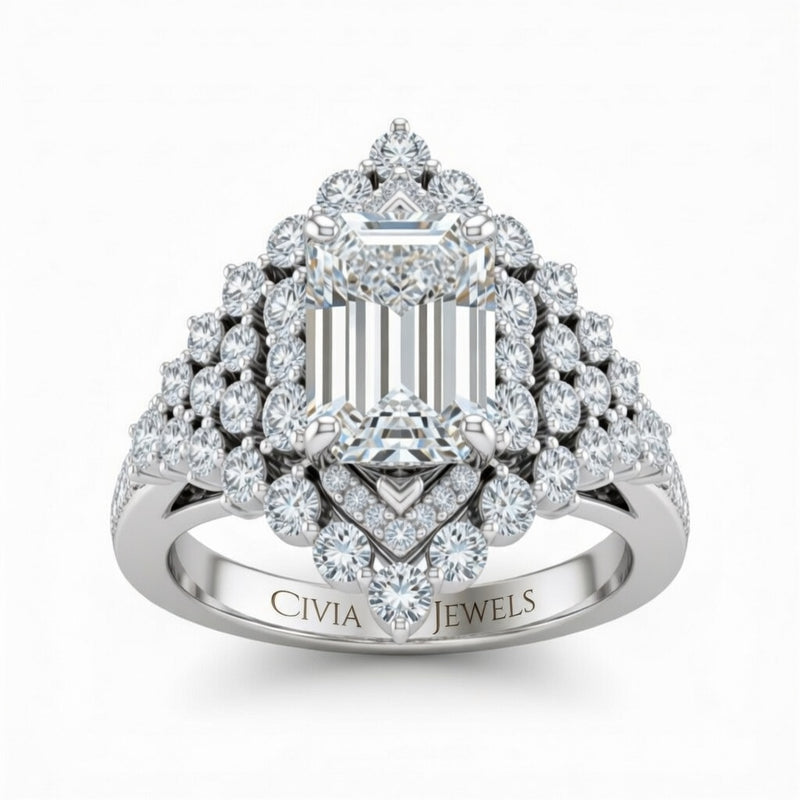 White Gold Emerald Cut Engagement Ring With Diamond Cluster Sides, Double Halo Frame And Pavé Shank