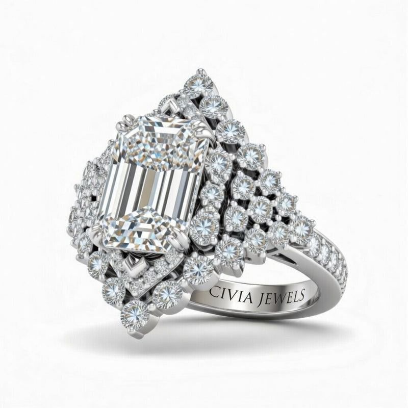 Silver Emerald Cut Engagement Ring With Diamond Cluster Sides, Double Halo Frame And Pavé Shank