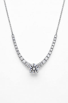 White Gold Round Brilliant Signature Graduated Diamond Necklace With Solitaire Center And Four-Prong Setting