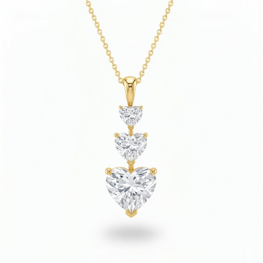 Yellow Gold Heart Brilliant Trivessa Diamond Graduated Drop Pendant Necklace With Triple Stone Prong Setting