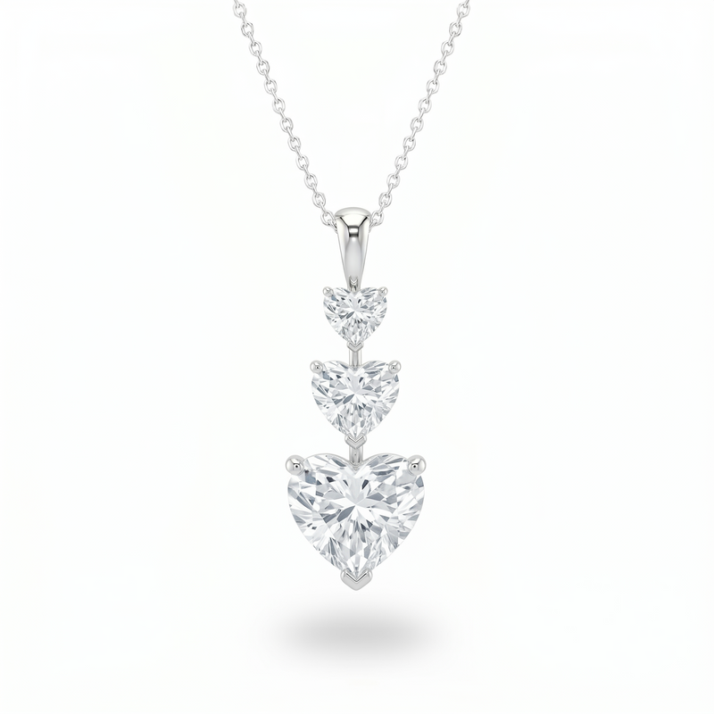 White Gold Heart Brilliant Trivessa Diamond Graduated Drop Pendant Necklace With Triple Stone Prong Setting