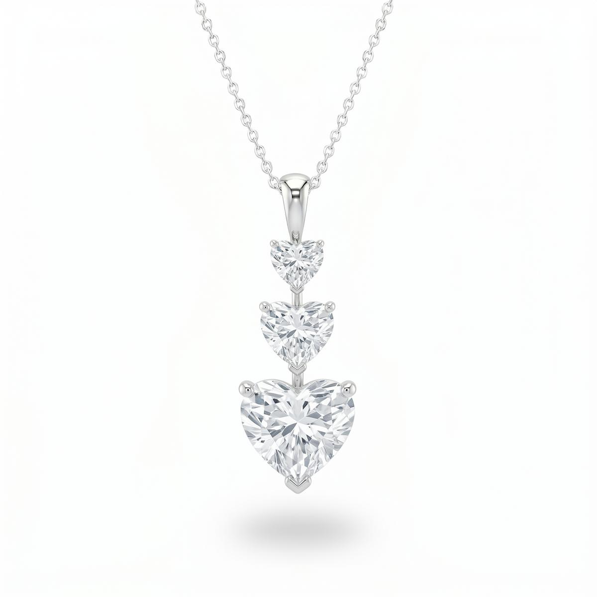 Silver Heart Brilliant Trivessa Diamond Graduated Drop Pendant Necklace With Triple Stone Prong Setting