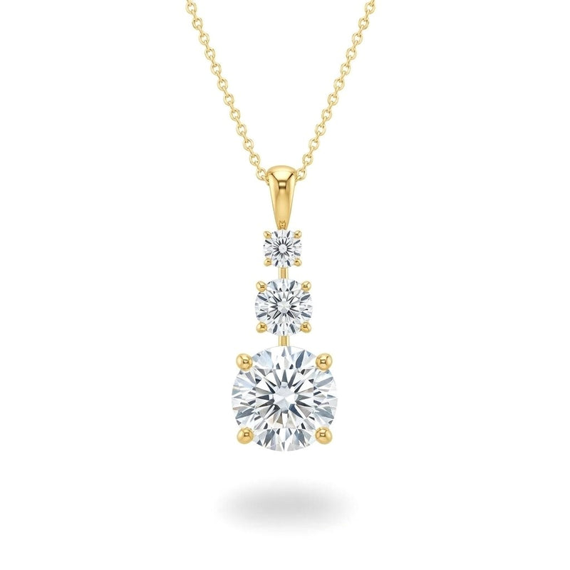 Yellow Gold Round Brilliant Trivessa Diamond Graduated Drop Pendant Necklace With Triple Stone Prong Setting