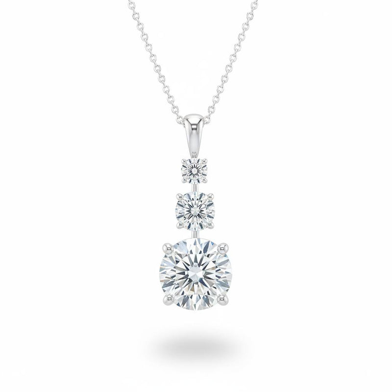 White Gold Round Brilliant Trivessa Diamond Graduated Drop Pendant Necklace With Triple Stone Prong Setting