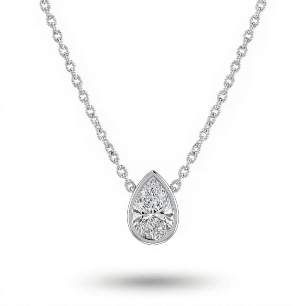 Silver Pear Brilliant Orlisse Diamond Bezel Set Solitaire Pendant Necklace With Minimal Floating Design