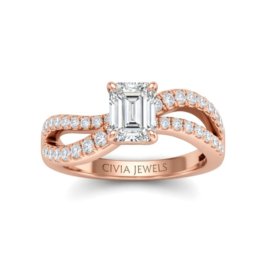 Rose Gold Emerald Diamond Twisted Shank Engagement Ring With Four Prong Setting And Pavé Band